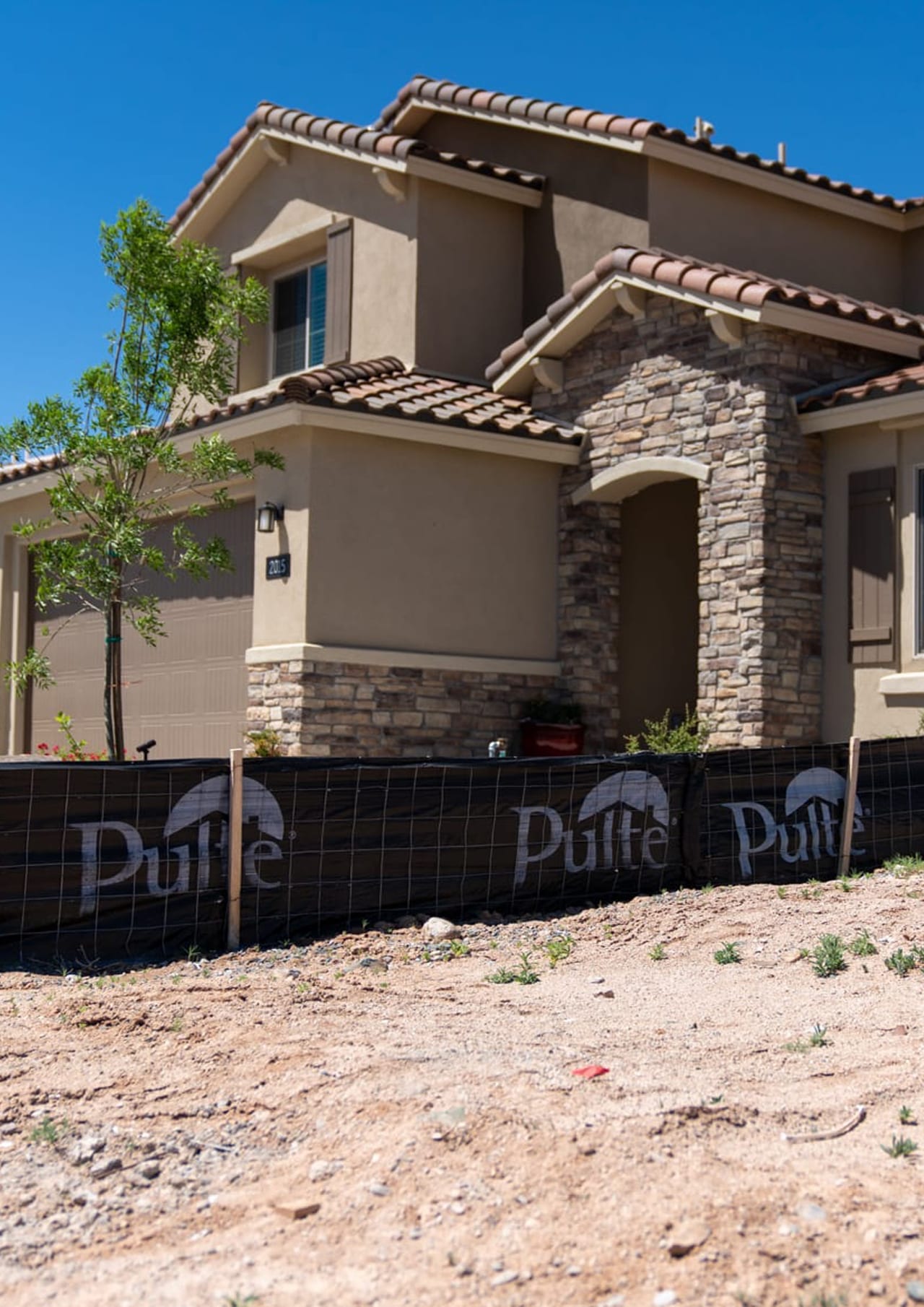 Image 1 of home with silt fence